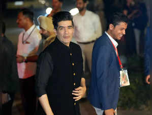 New Delhi: Fashion designer Manish Malhotra arrives to attend the engagement cer...