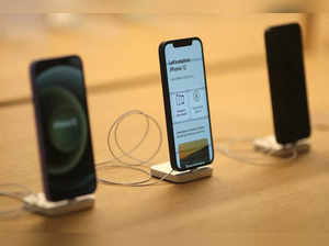 FILE PHOTO: IPhone 12 phones are seen at an Apple Store in Los Angeles, U.S.