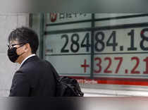 Asian stocks inch away from 10-month low, rate jitters linger
