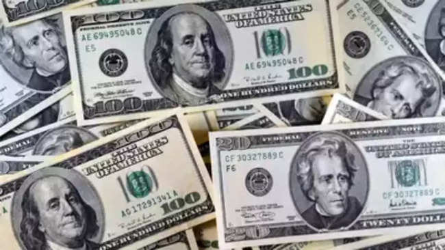 Dollar dips, but set for best quarter in a year