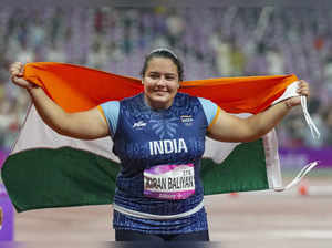 Hangzhou: India's Kiran Baliyan celebrates after winning the bronze medal in the...