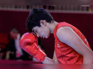 Hangzhou: India’s Parveen Hooda (red) during the Women’s 54-57kg Boxing Quarterf...