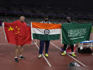 Medalist, from left, China's Liu Yang, bronze, India's Tajinderpal Singh Toor, g...