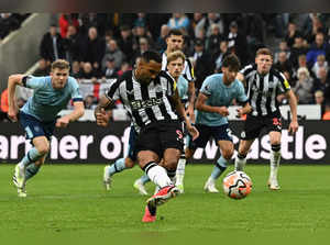 Newcastle United's English striker #09 Callum Wilson scores the opening goal from the penalty spot during the English Premier League football match between Newcastle United and Brentford at St James' Park in Newcastle-upon-Tyne, north east England on September 16, 2023.