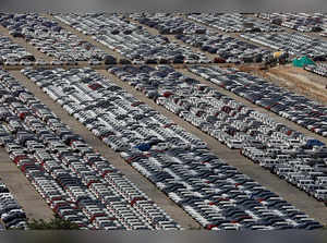 FILE PHOTO: Cars are seen parked at Maruti Suzuki's plant at Manesar