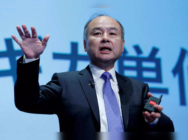 FILE PHOTO: Japan's SoftBank Group Corp Chief Executive Masayoshi Son attends a news conference in Tokyo