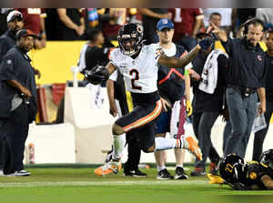 DJ Moore #2 of the Chicago Bears runs with the ball during the first half against the Washington Commanders at FedExField on October 05, 2023 in Landover, Maryland.