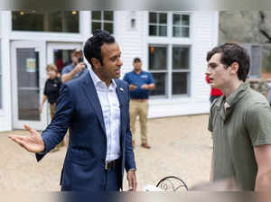 GOP Presidential Candidate Vivek Ramaswamy talks to a protester outside of of his SiriusXM Town Hall at New England College on October 6, 2023 in Henniker, New Hampshire.
