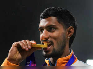 Hangzhou: Gold medallist Indian player Tilak Varma celebrates after the presenta...