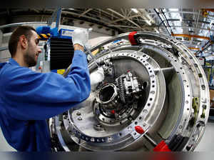 FILE PHOTO: A technician works on an CFM56 civil aviation jet engine at the SNECMA plant in Reau