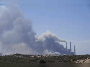 Some rise from the area of a power plant outside Ashkelon, Israel, on Saturday, ...