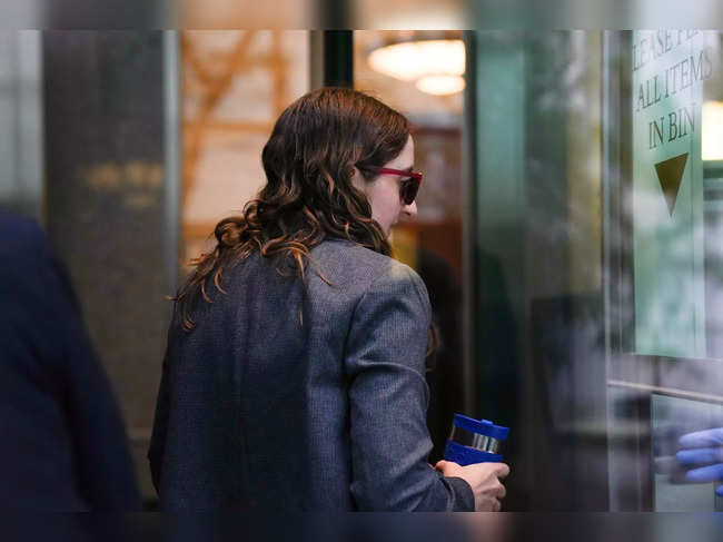 Sam Bankman-Fried’s former girlfriend, Caroline Ellison, walks through security at Manhattan Federal Court on October 10, 2023, in New York,  during the fraud trial against the FTX founder.