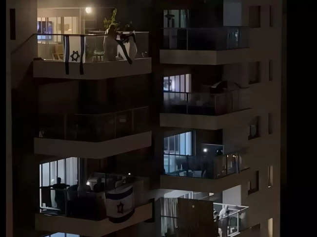 Israeli citizens in Tel Aviv showed solidarity & support for their defense forces by singing their national anthem, 'Hatikvah,' from their balconies.