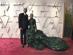 Los Angeles: Will Smith, left, and Jada Pinkett Smith arrive at the Oscars on Su...