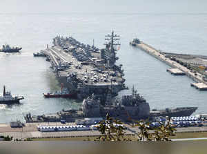 US aircraft carrier arrives in South Korea as North's leader Kim exchanges messages with Putin