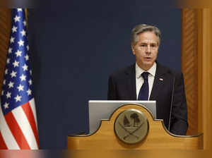 S. Secretary of State Antony Blinken attends a press conference with Qatar's Prime Minister and Foreign Minister following their meeting in Doha on October 13, 2023.