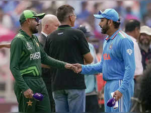 Ahmedabad: India’s captain Rohit Sharma and Pakistan’s captain Babar Azam during...