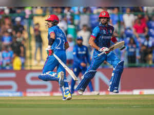 New Delhi: Afghanistan's Rahmanullah Gurbaz and Ibrahim Zadran run between the w...