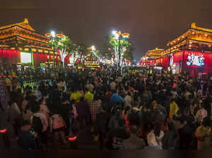 China's flagging economy gets a temporary boost as holiday travel returns to pre-pandemic levels