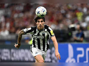 Newcastle United's Italian midfielder #08 Sandro Tonali eyes the ball during the UEFA Champions League 1st round group F football match between AC Milan and Newcastle at the San Siro stadium in Milan on September 19, 2023.
