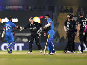 Chennai: New Zealand's captain Tom Latham being congratulated by Afghanistan's I...
