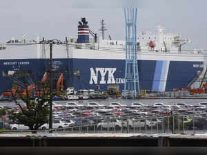 Japan's exports rise and imports decline in September as auto shipments to US and Europe climb