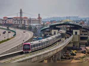 Bengaluru: A train runs on the Bengaluru Metro's Purple Line, which is fully ope...