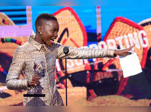 Actress Lupita Nyong'o accepts the Best Supporting Female award for '12 Years a Slave' onstage during the 2014 Film Independent Spirit Awards at Santa Monica Beach on March 1, 2014 in Santa Monica, California.
