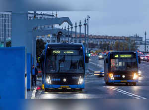 Electric buses are parked at a charging station in the centre of Moscow