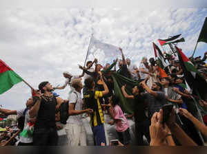 People protest in support of Palestinians in Gaza, as the conflict between Israel and Hamas continues, in Algiers