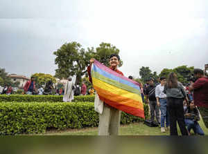 New Delhi: LGBT rights activists and supporters on the premises of the Supreme C...