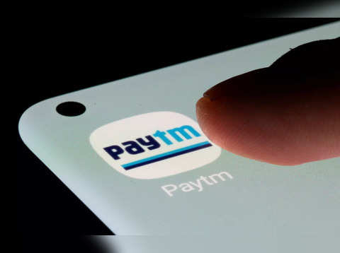 Buy Paytm at Rs 980-987