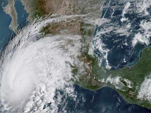 Hurricane Norma makes landfall near Mexico's Los Cabos as Tammy threatens islands in the Atlantic