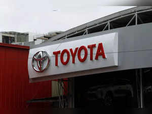 FILE PHOTO: Toyota logo is seen at a Toyota Society Motors showroom, in Karachi
