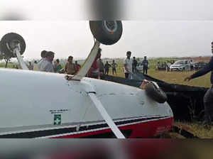 People seen at the incident site after an aircraft of Red Bi...