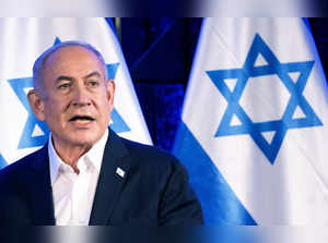 Israel's Prime Minister Benjamin Netanyahu make a statement as the US President listens on before a meeting in Tel Aviv on October 18, 2023, amid the ongoing battles between Israel and the Palestinian group Hamas.