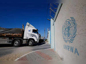 Aid trucks arrive at a UN storage facility in the central Gaza Strip