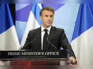 French President Emmanuel Macron addresses media during a joint press conference with Israeli Prime Minister in Jerusalem on October 24, 2023.
