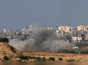 A picture taken from the Israeli side of the border with the Gaza Strip on October 15, 2023, shows smoke billowing after Israeli bombardment of an area in the north of the Palestinian enclave.