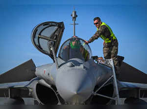 A French army pilot sits in the cockpit of a Dassault Rafale fighter jet prior to take off on a mission at Fetesti Air Base, in the commune Borcea, near the town of Fetesti, Romania on October 19, 2023.