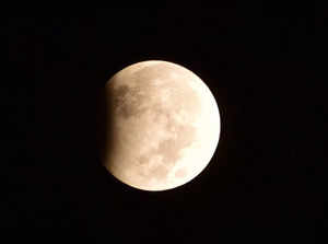 Guwahati: A view of partial lunar eclipse as seen in the sky from Guwahati, earl...