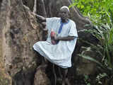 In Benin, Voodoo's birthplace, believers bemoan steady shrinkage of forests they revere as sacred