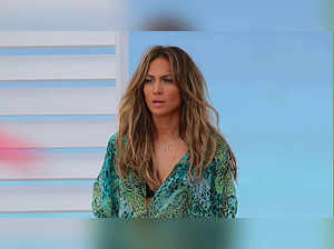 Jennifer Lopez stuns in plunging green sequin outfit for night out with Ben Affleck. Details here