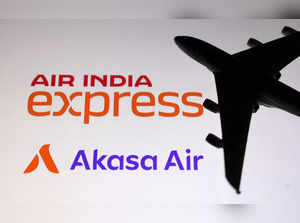 Illustration shows Air India Express and Akasa Air logos