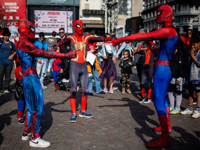 Participants, clad in skin-tight blue costumes and red masks, celebrated the iconic character created by Stan Lee and Steve Ditko.