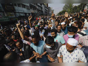 Bangladesh's opposition supporters clash with police as tensions run high ahead of general election