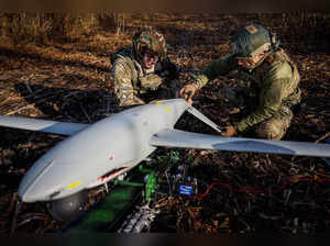 Servicemen prepare the Shark drone for launching in Kharkiv region