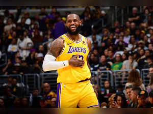 LeBron James #23 of the Los Angeles Lakers smiles during the game against the Orlando Magic on October 30, 2023 at Crypto.