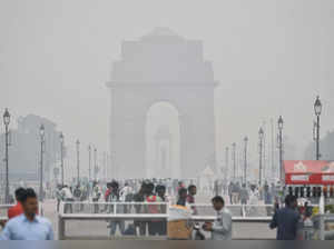 A thick layer of smog engulfs the India Gate as the AQI...