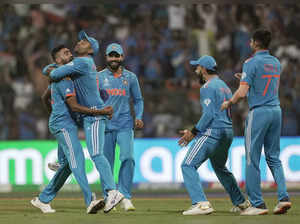Mumbai: India's Mohammed Siraj celebrates with teammates the wicket of Sri Lanka...